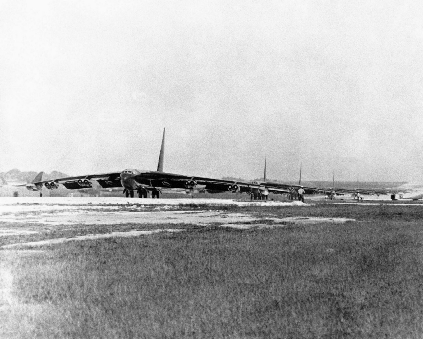 B-52D bombers wait to take off from Andersen Air Force Base, Guam, for a Linebacker II mission over North Vietnam.