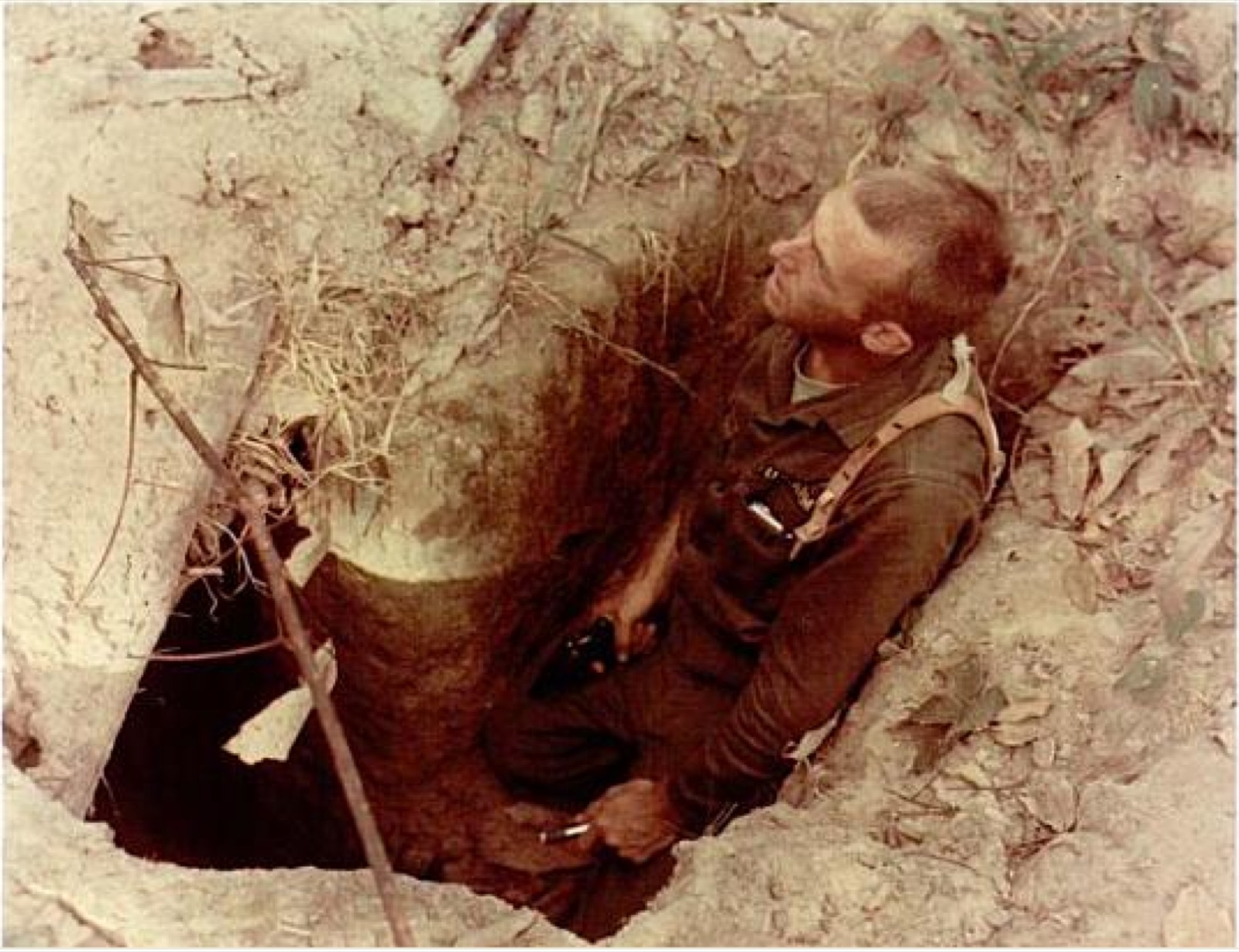 A US soldier entering a tunnel during Operation Crimp
